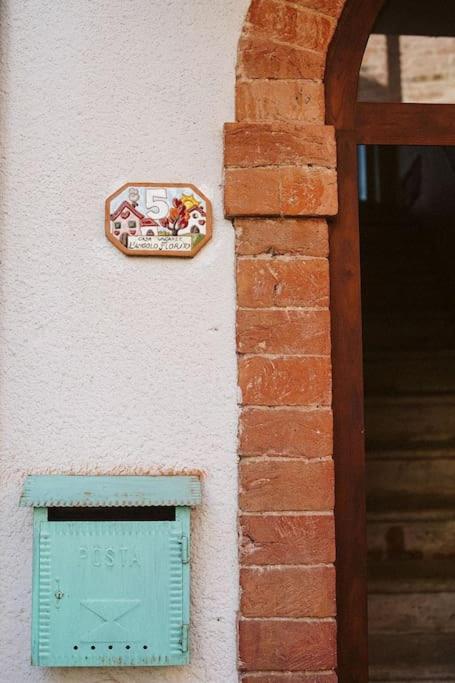 Casa Vacanze L'Angolo Fiorito Беттолле Экстерьер фото