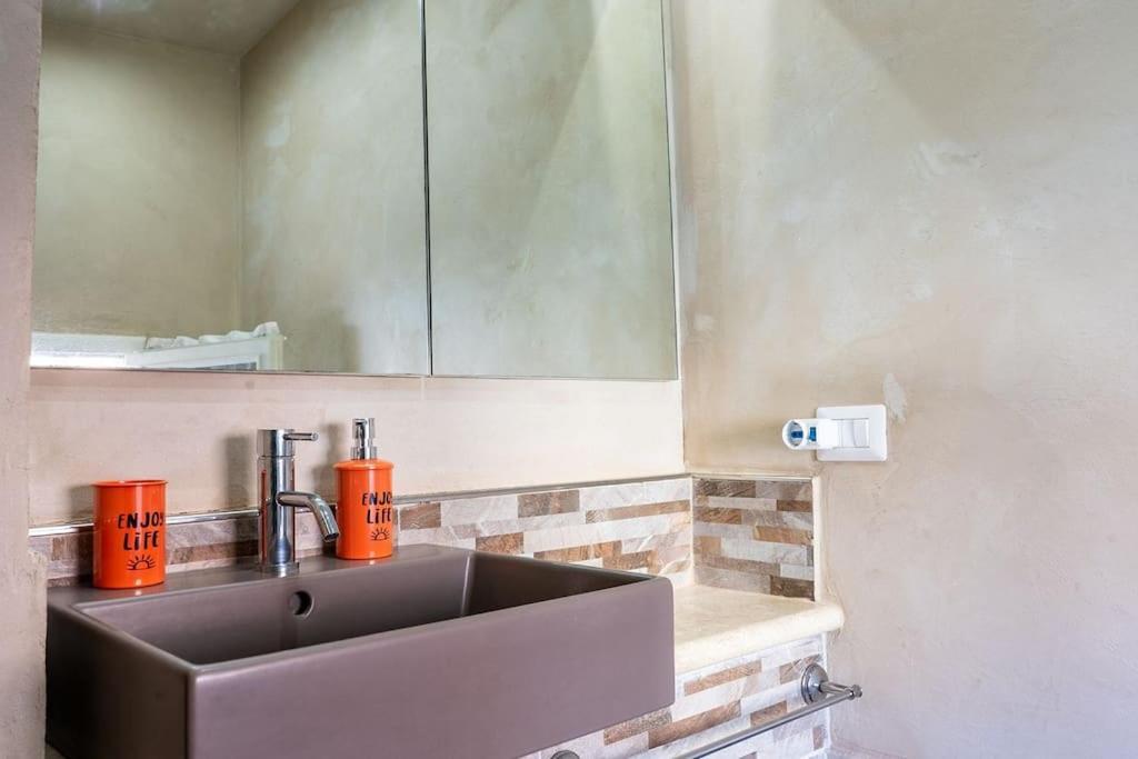 Casa Vacanze L'Angolo Fiorito Беттолле Экстерьер фото